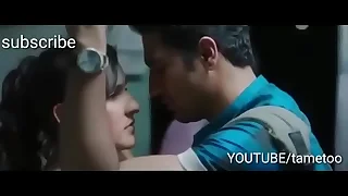 Indian boy and girl kissing back burnish apply morning Mumbai local train first time