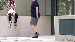 Abstruse girl with skateboard flashing in public