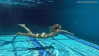 Mary Kalisy Russian Pornstar swims leafless in the pool